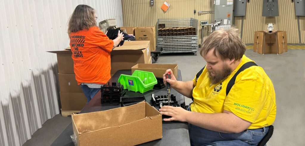 Laclede Industries workers assembling and packing